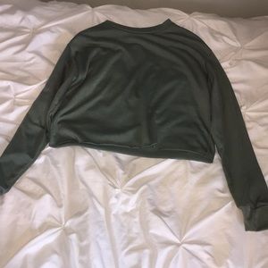 Green long sleeved shirt